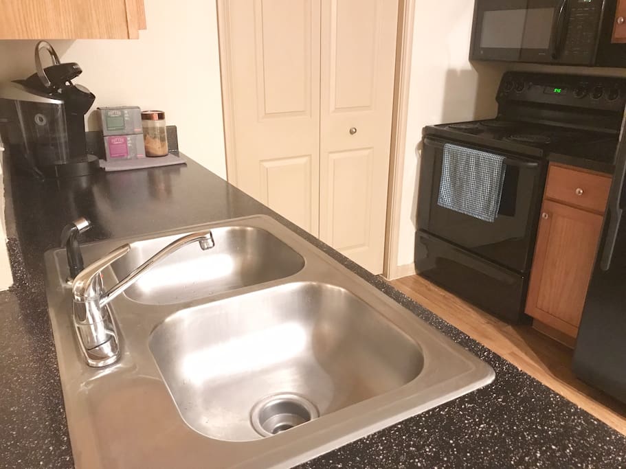 Kitchen with Keurig machine and K cups ready to use.