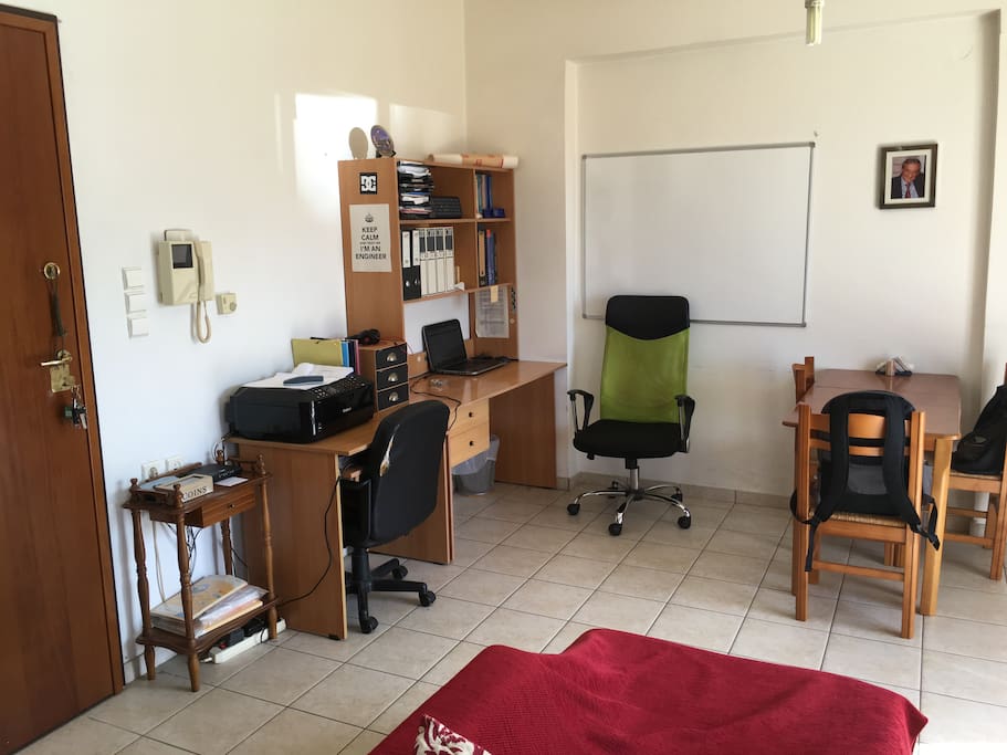 Desk, wifi printer, wireless internet, camera on the front door of the building