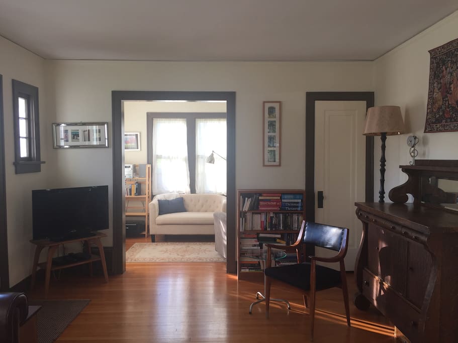 Sitting room and TV in living room