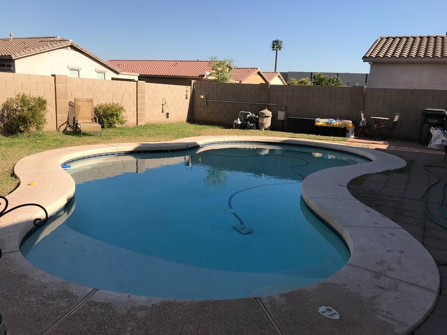Back yard pool with BBQ