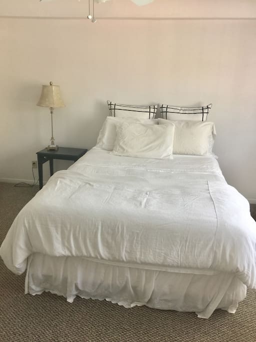 Queen size bed with plush mattress