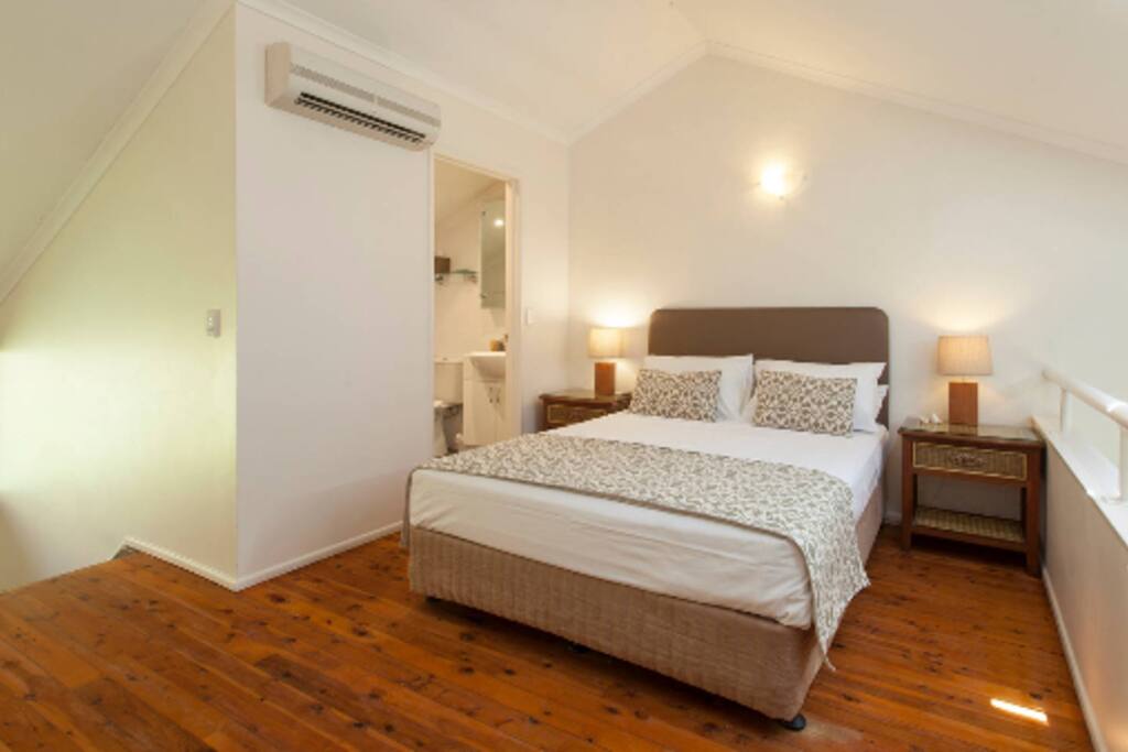 Loft Bedroom with ensuite bathroom and skylight