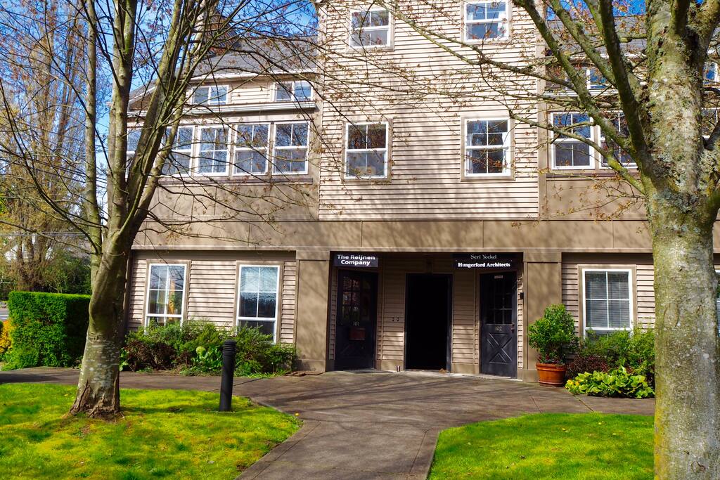 Front of building. The middle door is the entry way to the condo