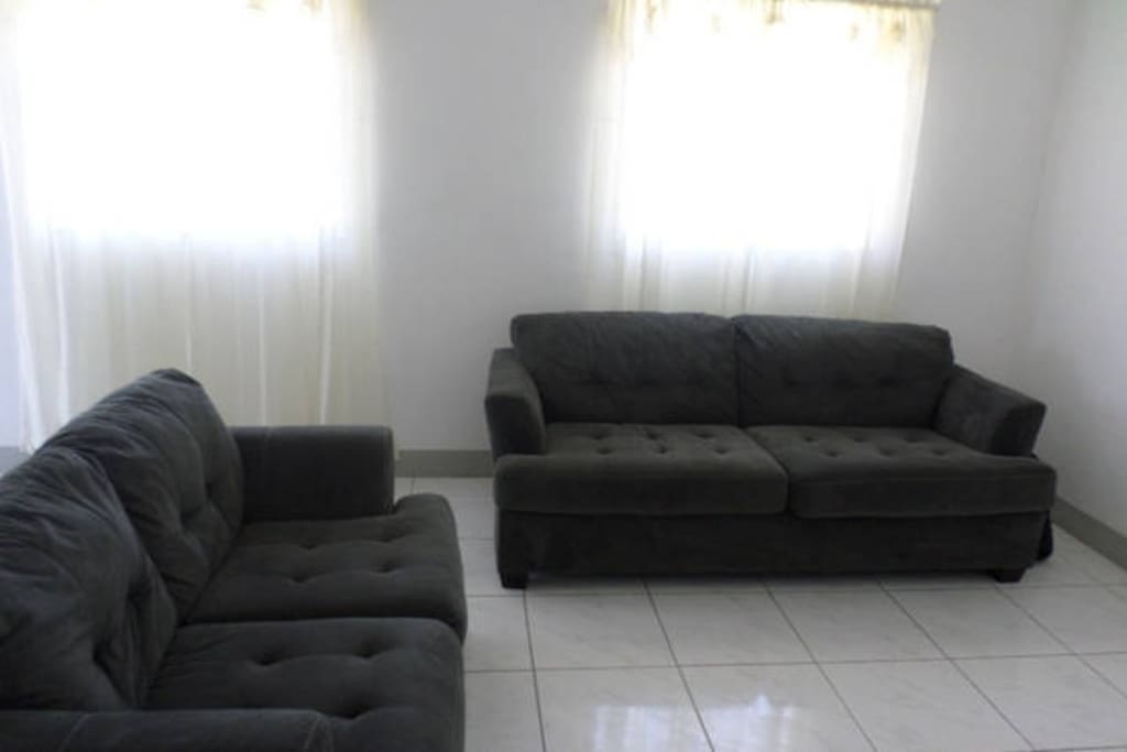 The living room section of the apartment.