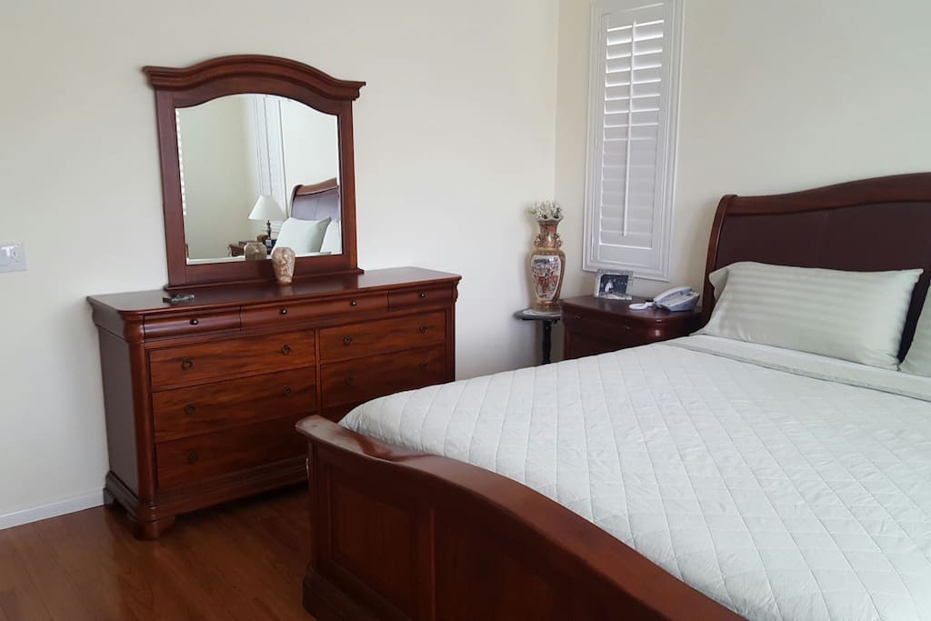 Drawer space in the dresser in addition to a walk in closet off the bathroom.