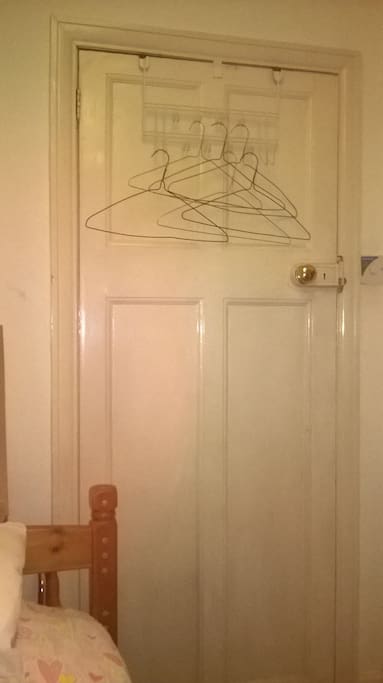 You can hang your clothes on the door.