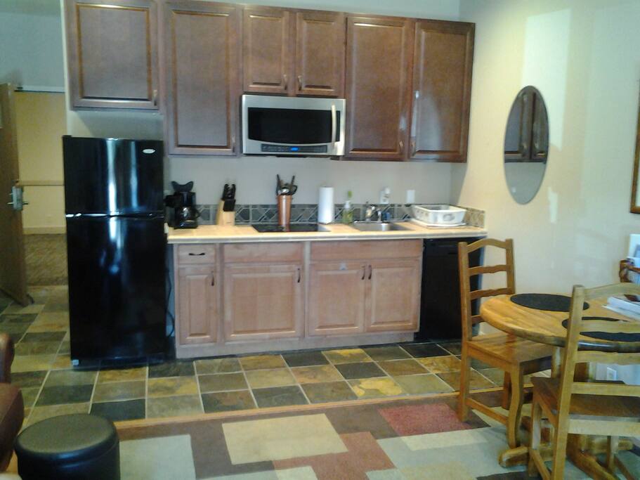 Plenty of storage and working area in kitchen.