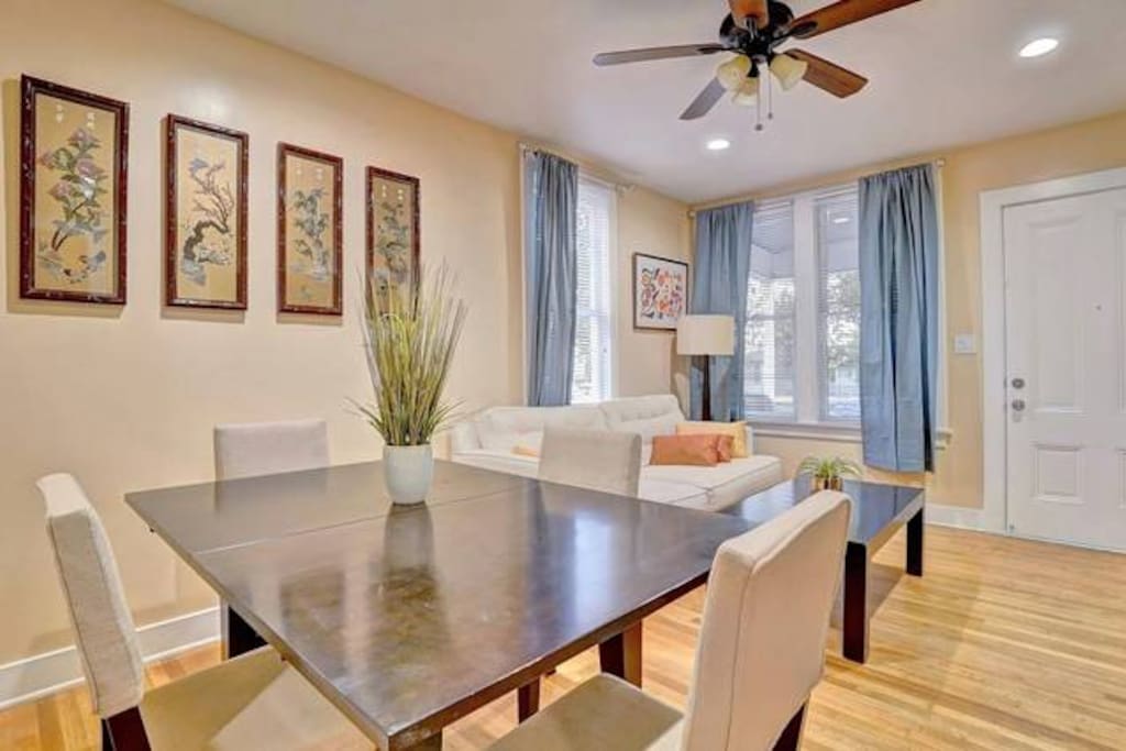 Living room and dining room with TV, entertainment center and high-speed fiber wifi internet.