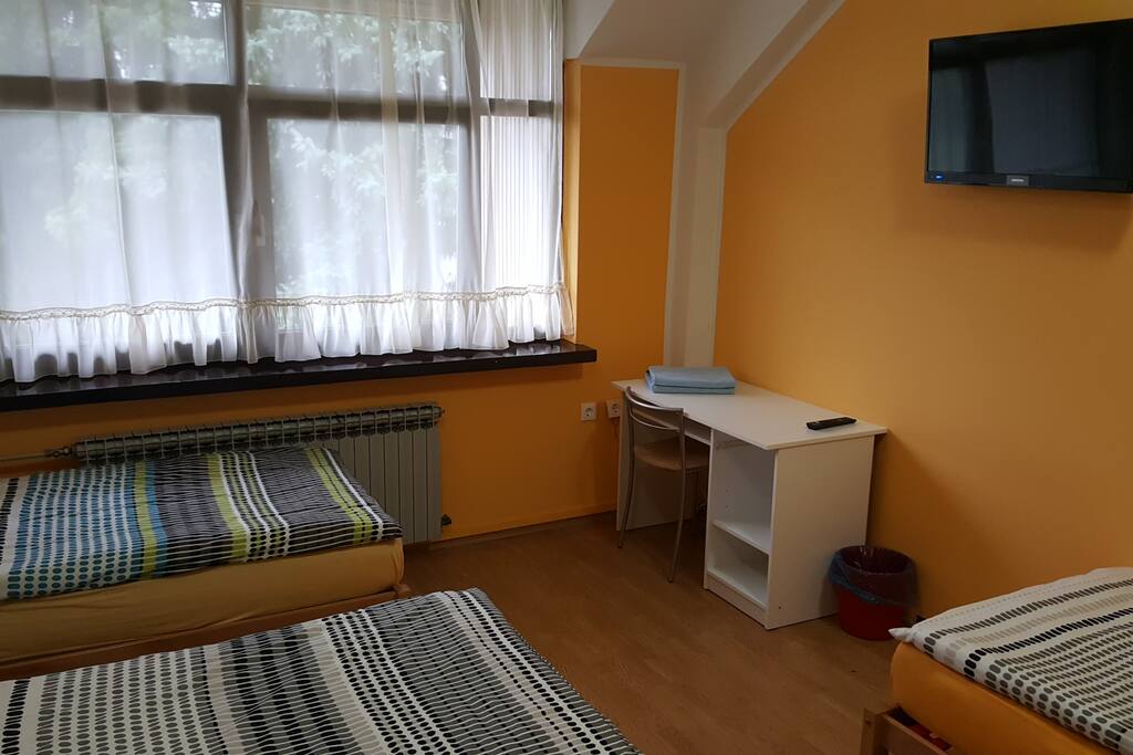 Rooms with 3 separated bets, shared Bethrooms