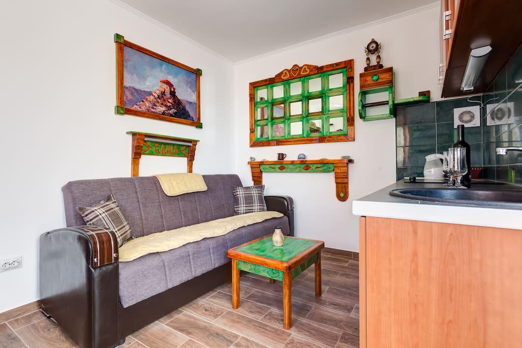 Living room has a comfortable bed, TV with cable TV, wardrobe, air conditioning and Wi Fi internet connection.