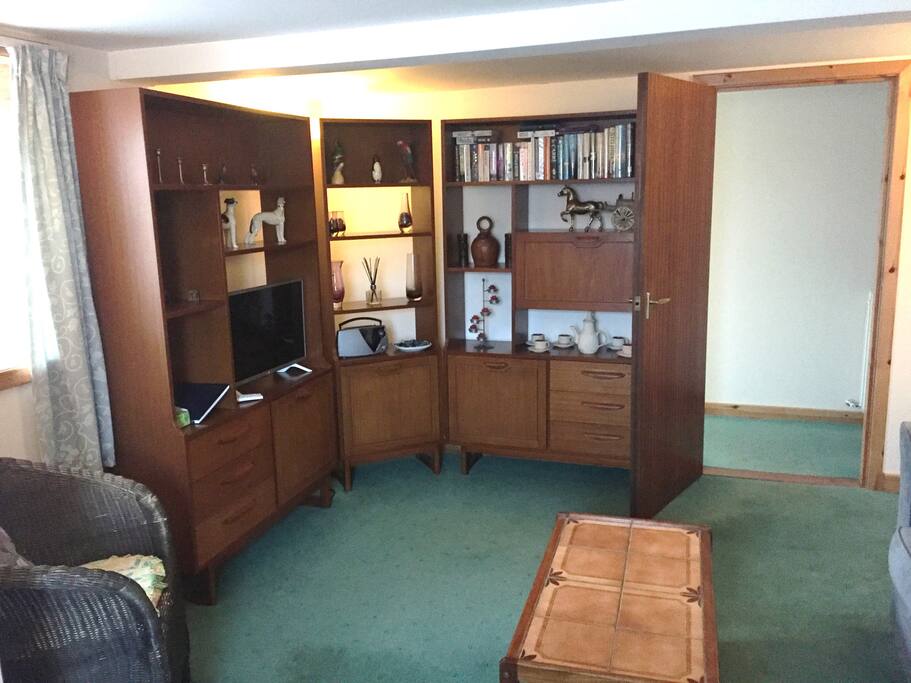 Cosy sitting room with sofa bed