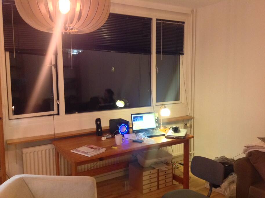 desk with laptop and free wifi