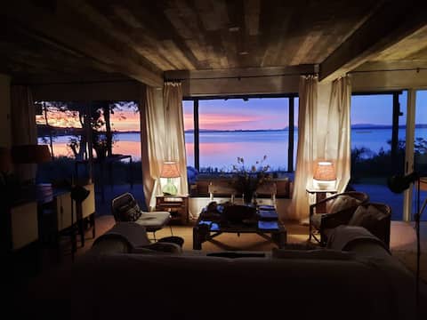 Spectacular house and sunsets over Laguna Sauce