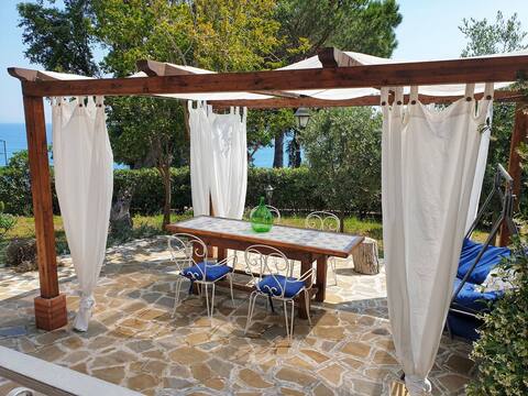 Villa with garden and sea view