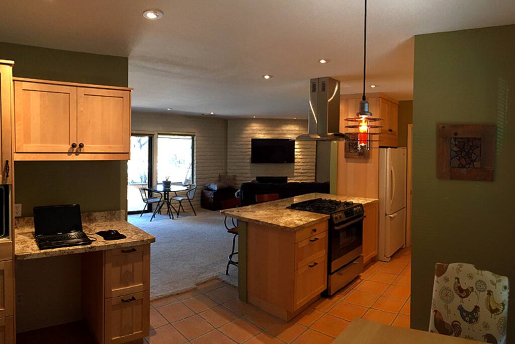 Full kitchen with necessary cooking utensils, dishes, dishwasher, gas stove, microwave. Even frosted mugs awaiting you in the freezer!