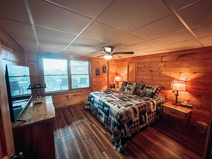 Burrs Burra Suite:  Another large bedroom on the basement level offers a king bed, TV, and shared bathroom