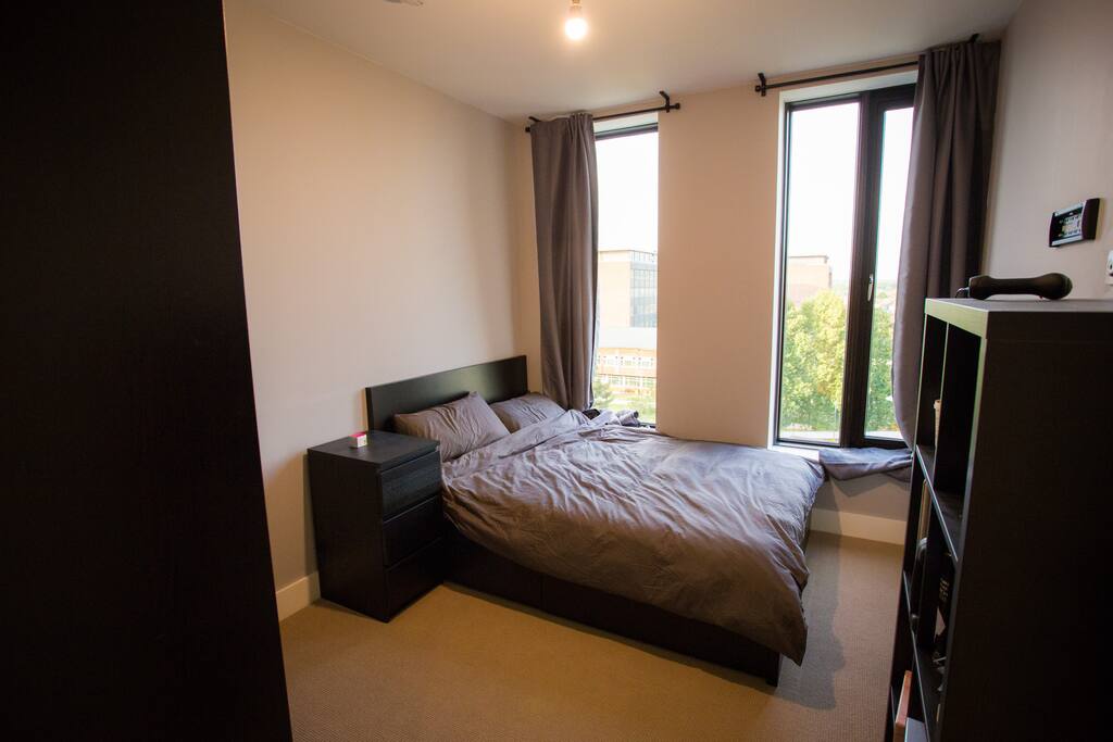 Large double room with floor to ceiling windows
