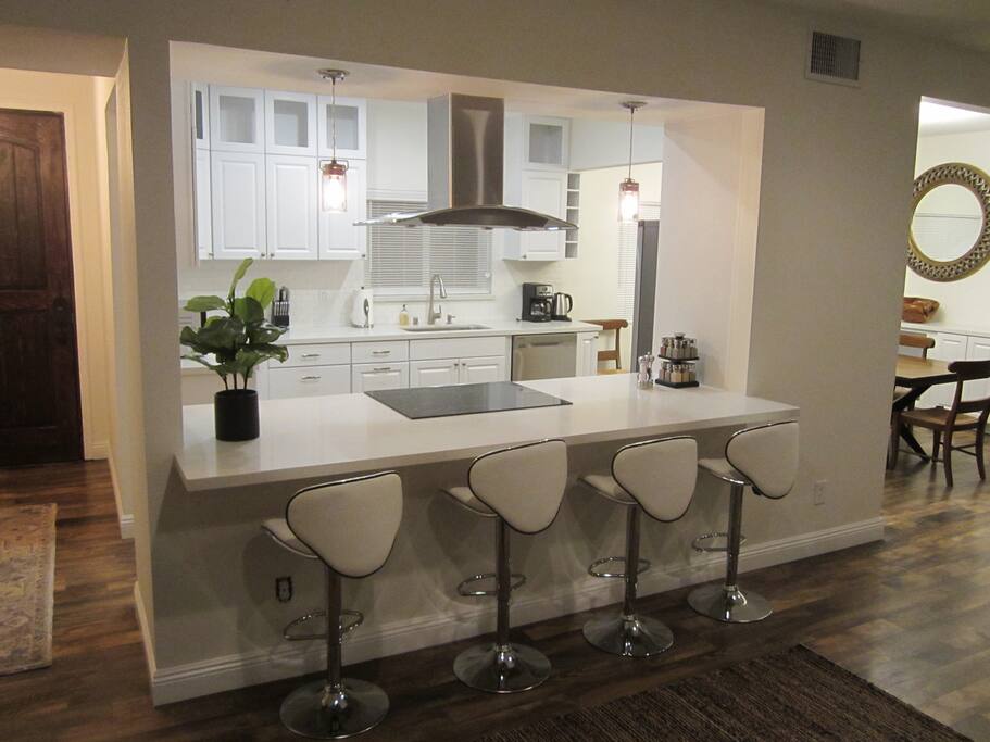 Huge great room with kitchen, dining, living and TV room
