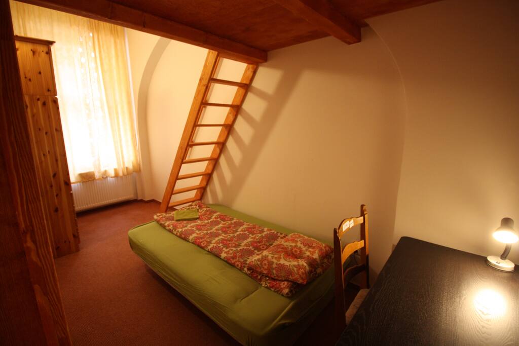 YOUR BEDROOM A arranged for 3 persons, writing desk , wardrobe