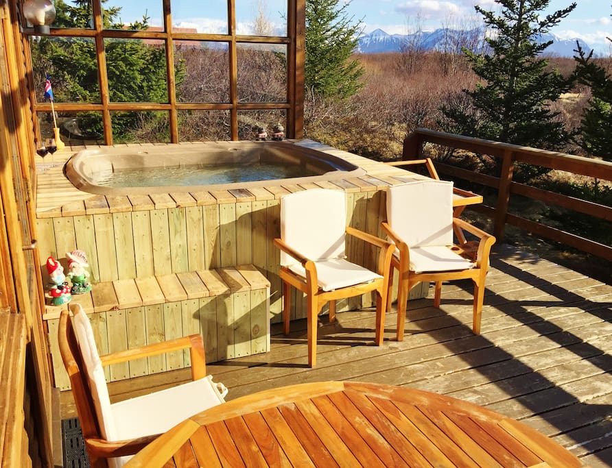 The Hot Tub on the porch with a mountain view to the South and North.