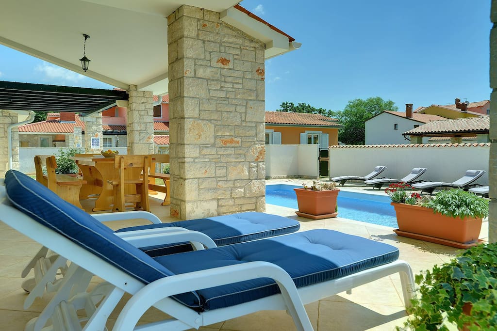 Sun loungers by the pool