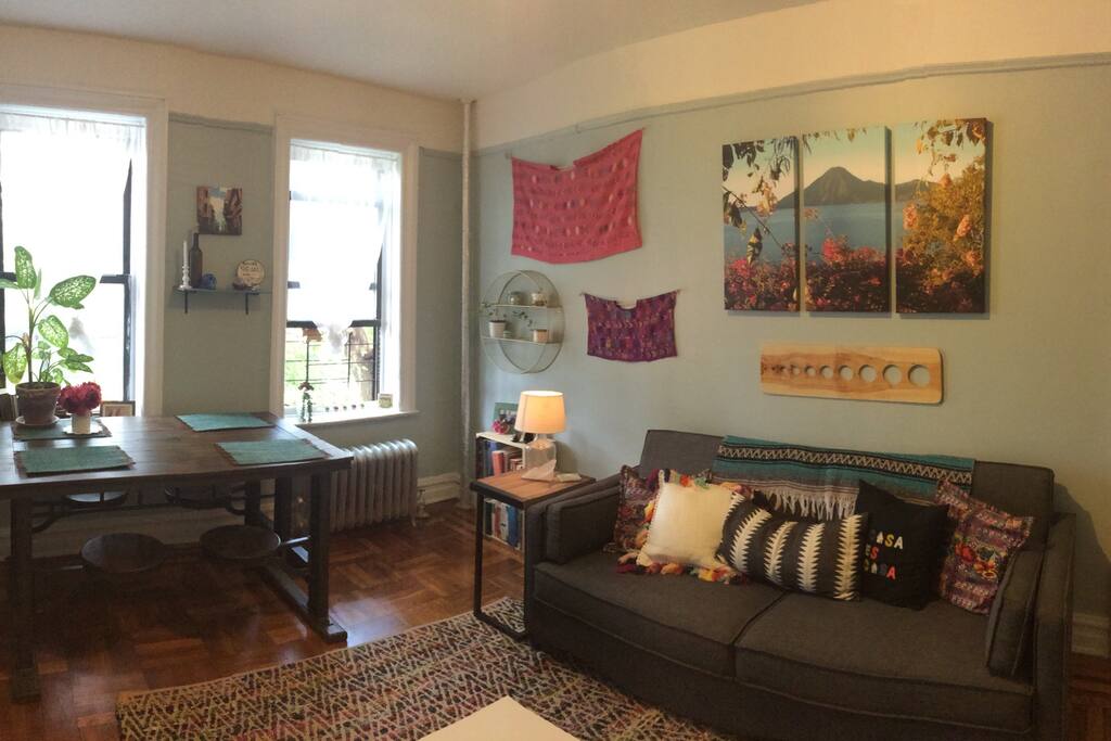 Living room, this couch can become a bed, about the size of a double bed