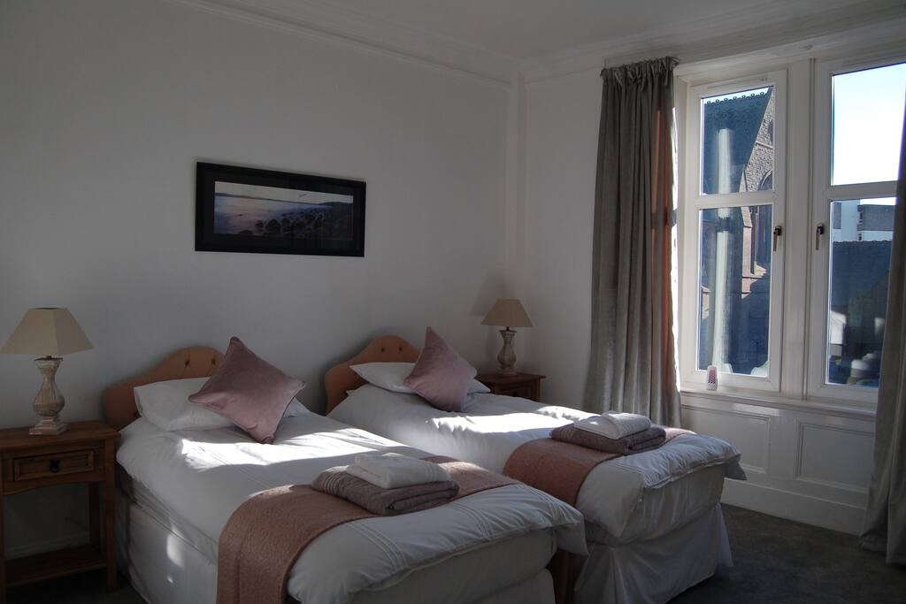 Master bedroom to the front is large and very bright. Zip & Link beds for super-king option.