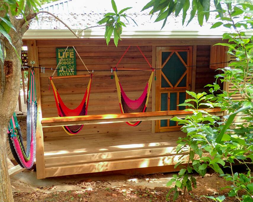 Front of casita with hammocks & chairs