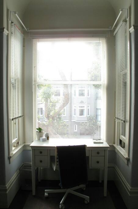 workspace, in 5' wide bay window