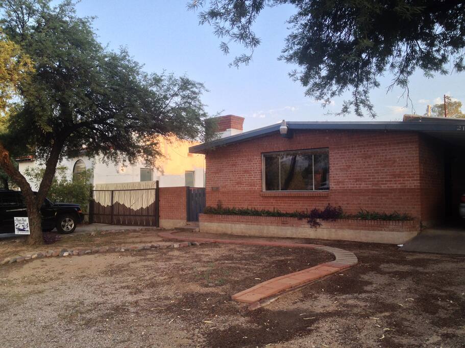 Up to 2 cars can park in the bare part of the front yard