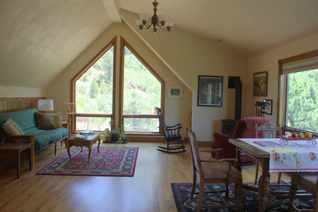 Spacious living area with south facing windows.