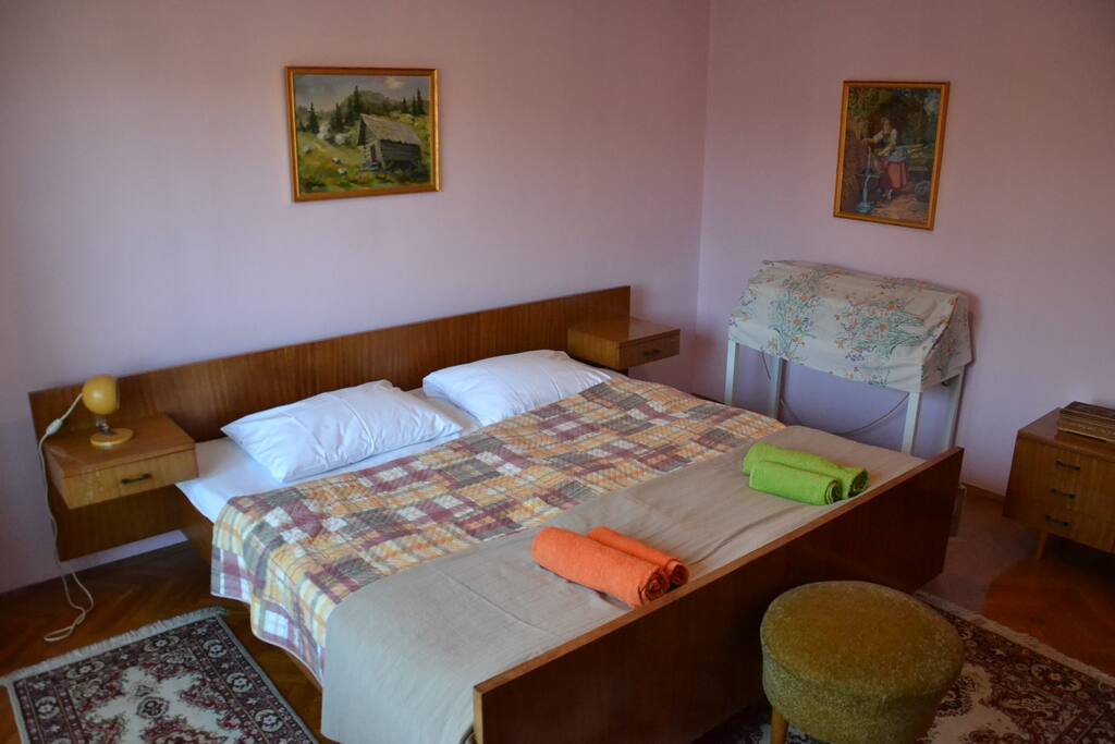Master room with double bad and balcony