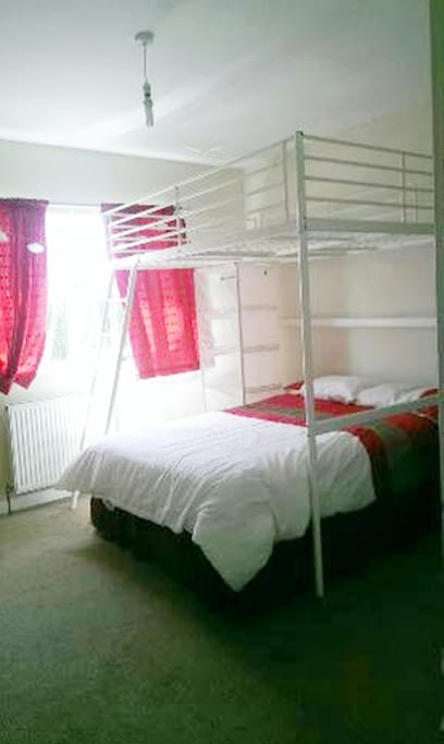 double bed with high sleeper double above