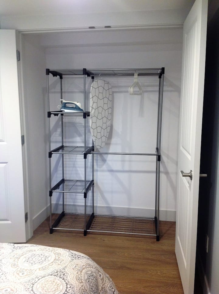Each bedroom has its own closet;  iron & ironing table also provided 