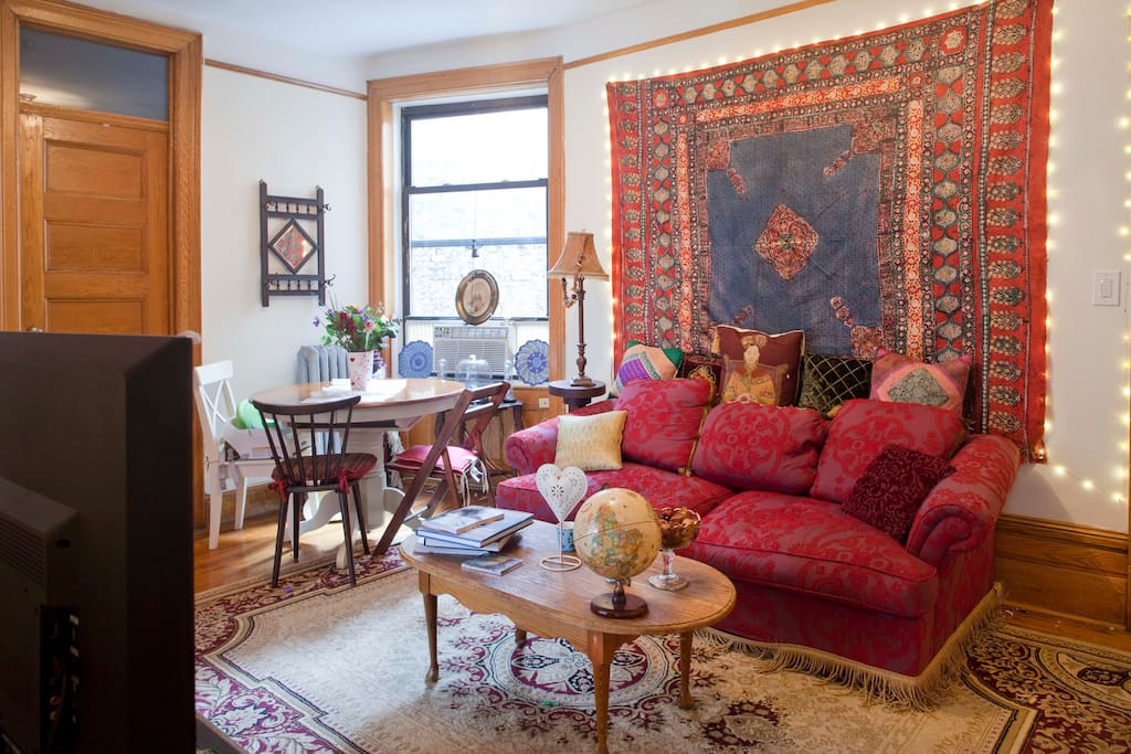 Spacious living room and dining area -- comfy couch and TV with netflix and such.