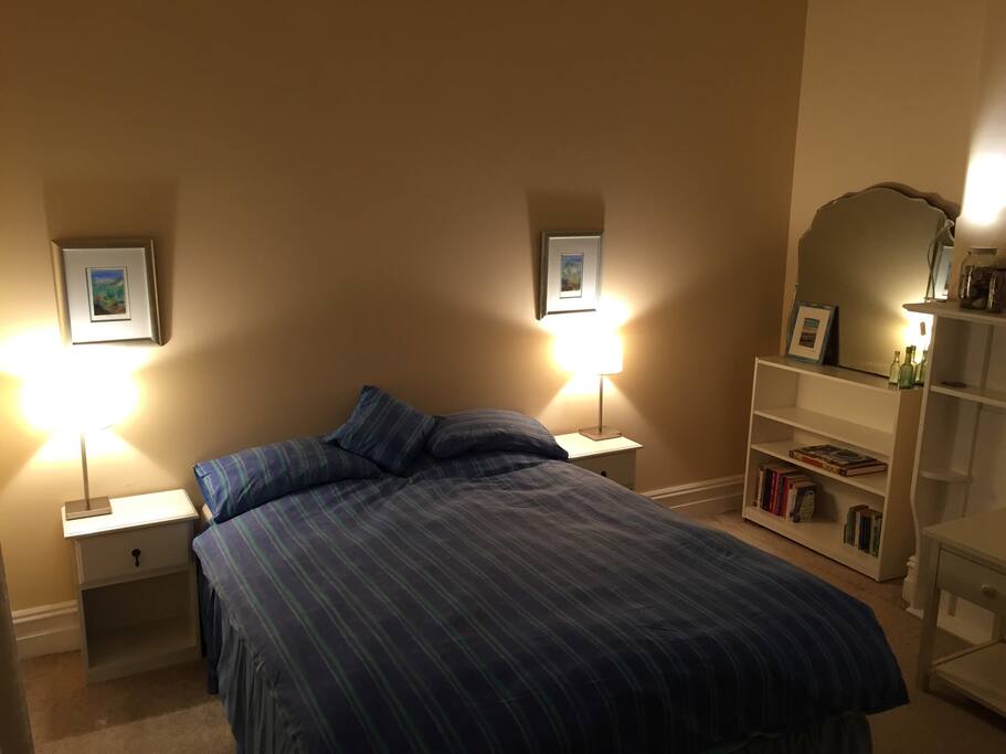 Large guest room, built in robes and view to cottage garden