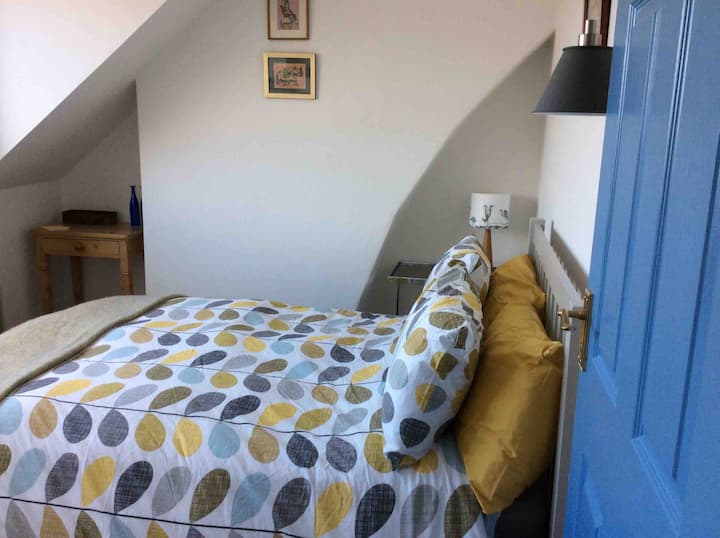 Private attic bedrooms with own shower room.