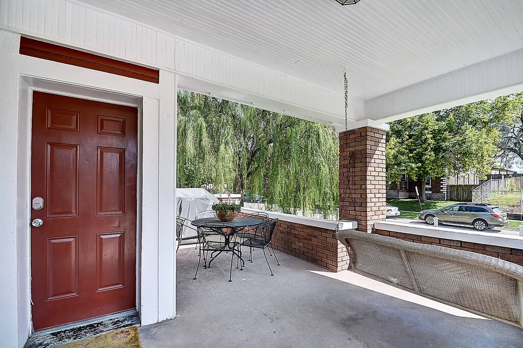 Unit receives full access to porch with swing, grill and table for five