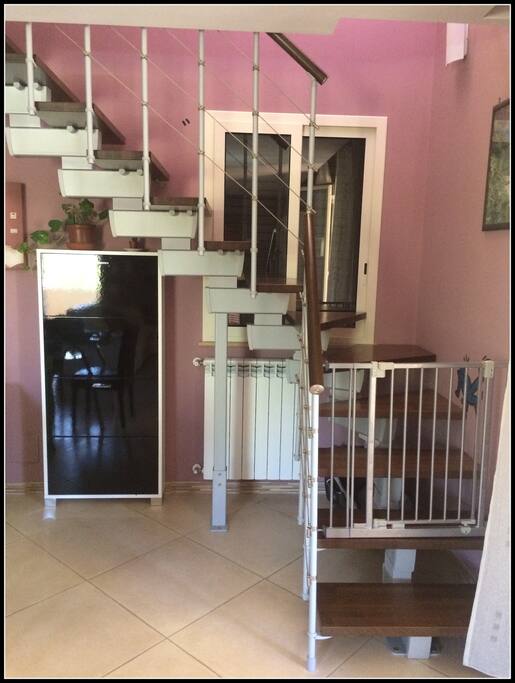 The stairs up to the bedrooms