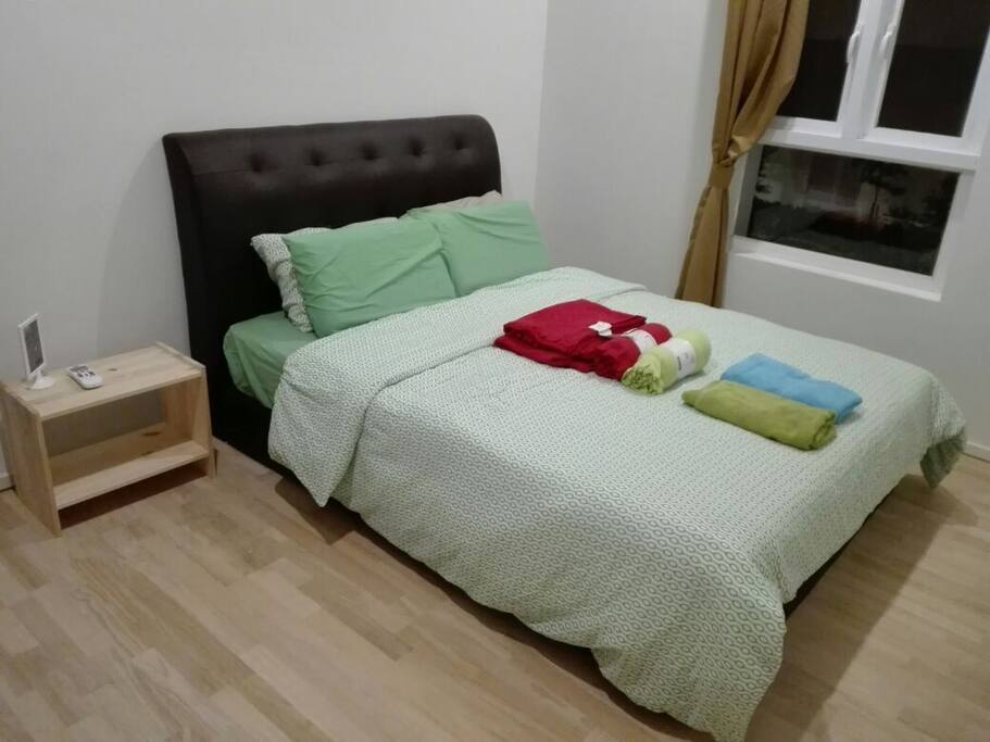 Queen-sized bed in second bedroom