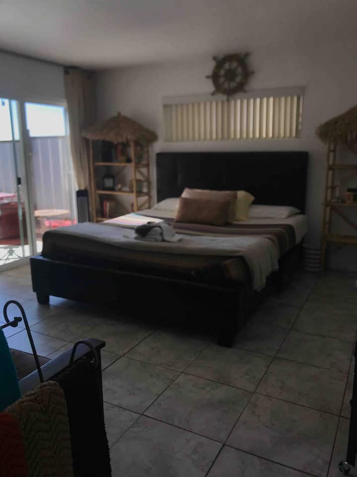 This is the GIANT bed in the master bedroom! There are two more cots in the closet and the futon folds out into a full size bed! This room has GREAT views of the lake and mountains all from the bed!