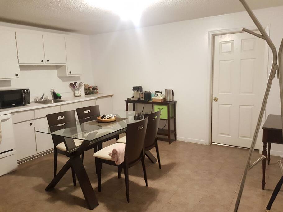 Entrance opens up to the kitchen, equipped with all the necessities.