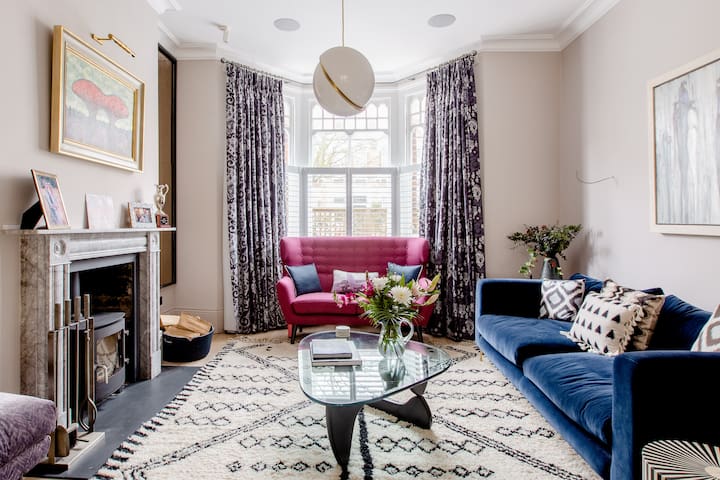 Chill in the Sleek Teal and Marble Kitchen at a Period Pad