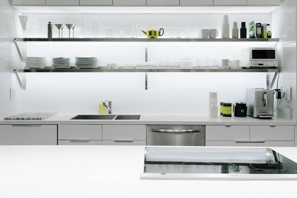 Open kitchen detail, including push-button espresso machine.
