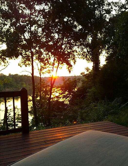 Sunset from the gazebo in the backyard. This portion of home is shared with host.