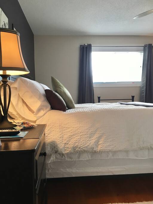 Cozy queen bed.