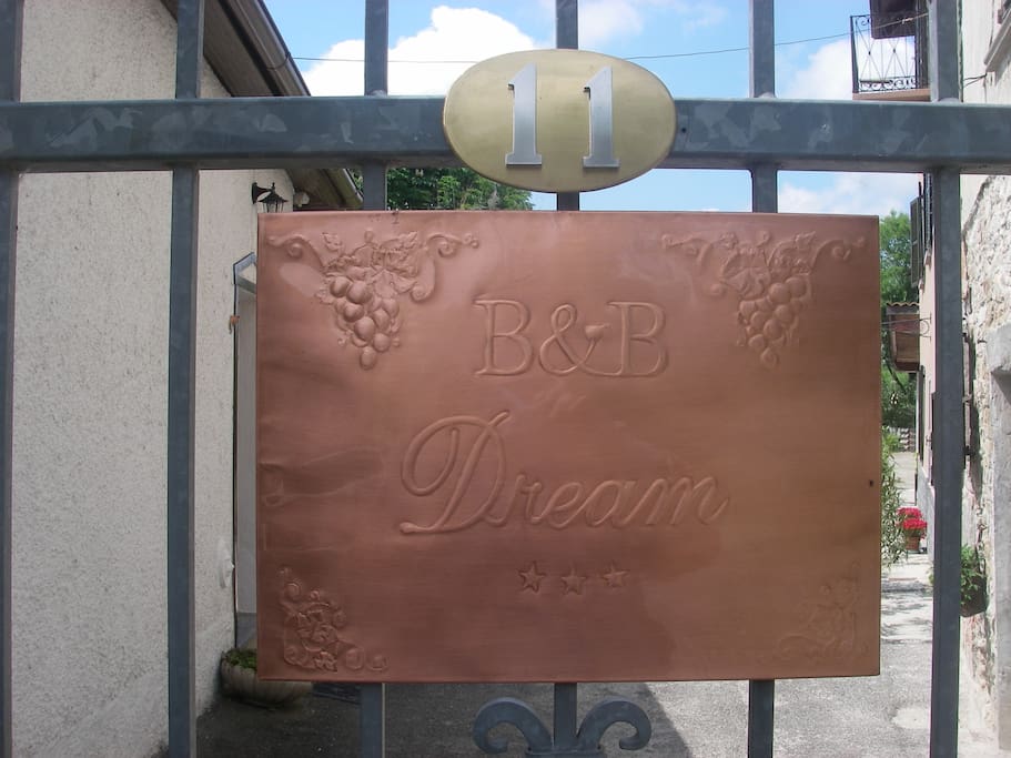 OUR LOGO DISPLAYED AT FRONT GATE
