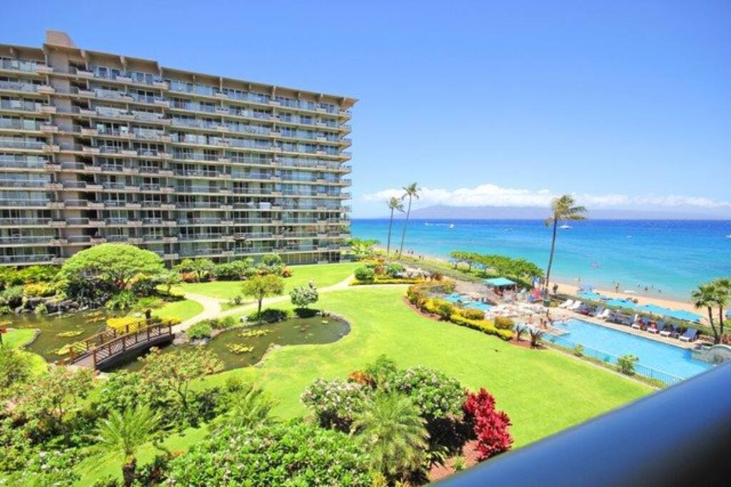 Beautiful view of courtyard below, beach, ocean and Lanai
