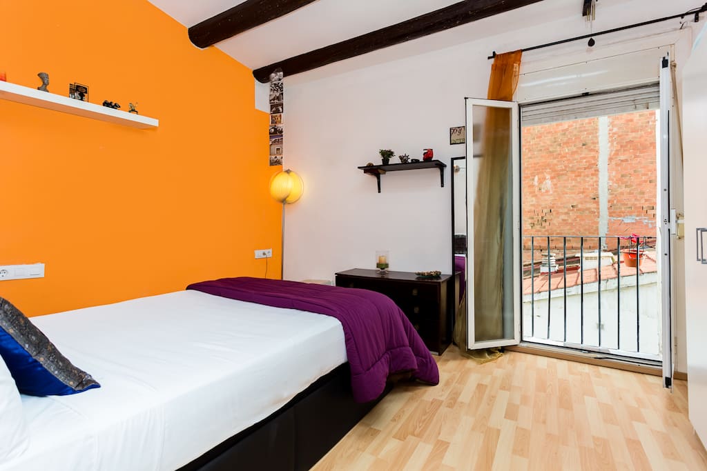 Bedroom with original beams on the roof