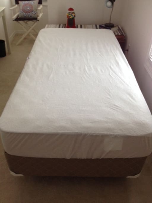 Mattress protector washed after each guest.